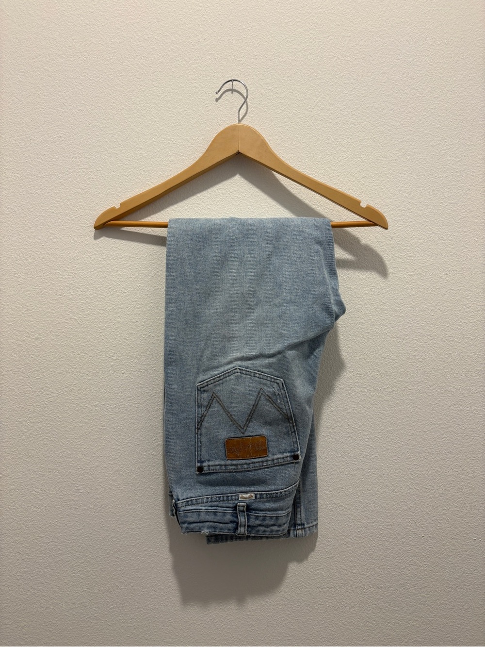 Wrangler Faded Light Blue Denim Jeans with Leather Patch